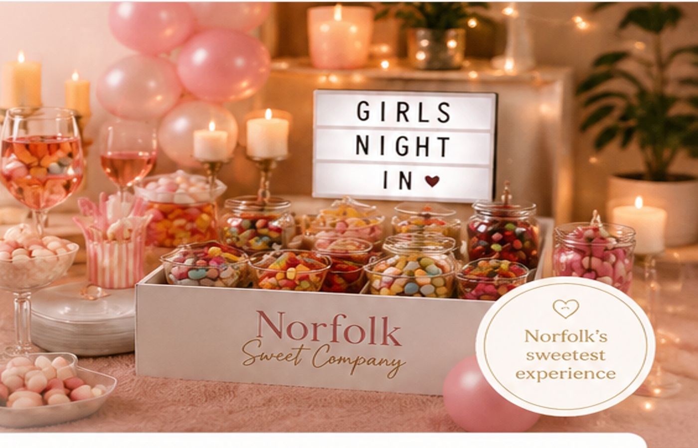 Cosy Girls Night In sweet box with sweets, drinks and warm pink styling